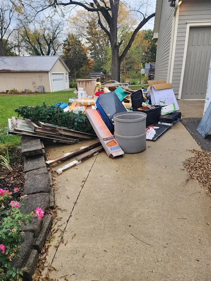 Dumpster being loaded with debris for 30 Yard Dumpster Rental in Temecula